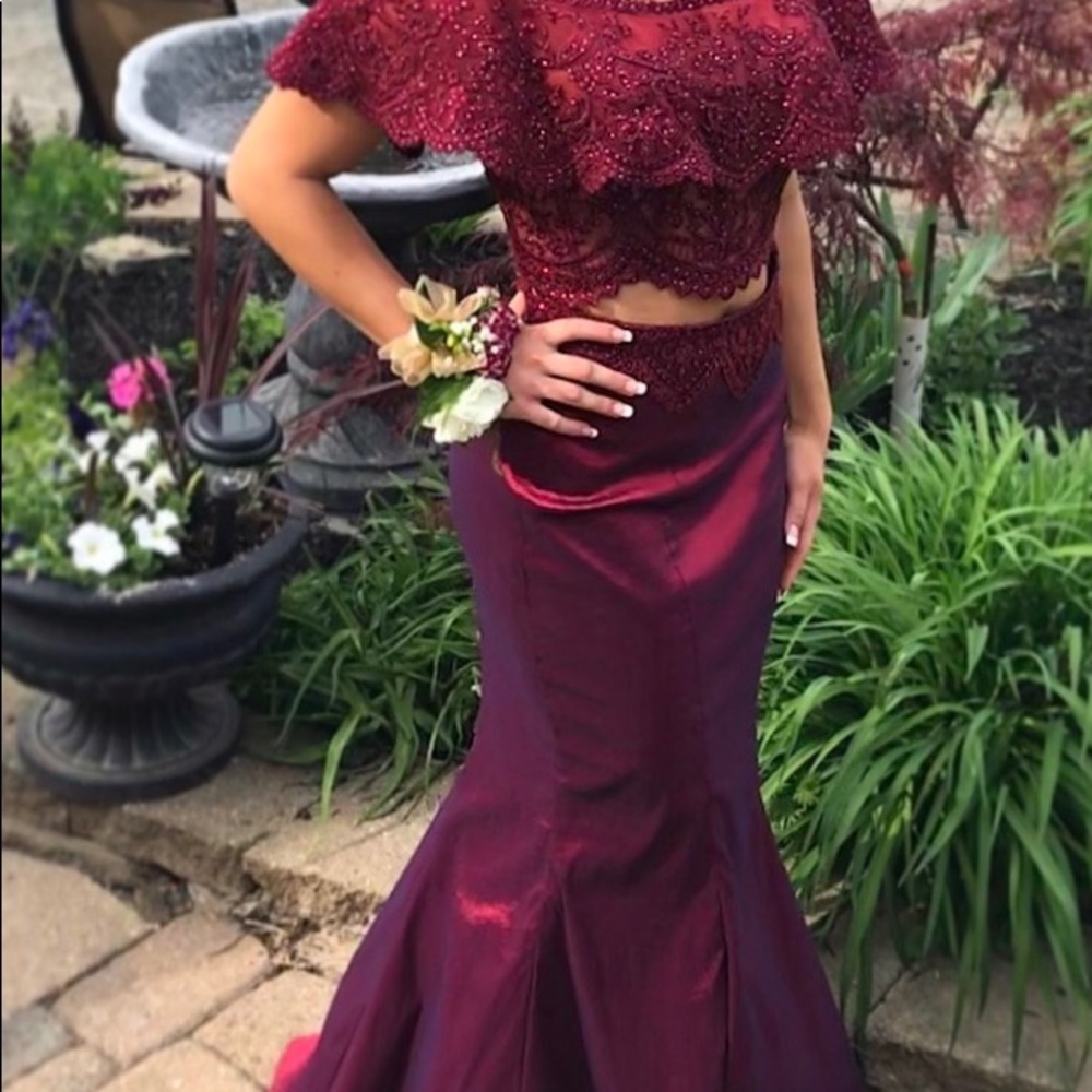 Gorgeous 2-piece Prom dress with embellished top.